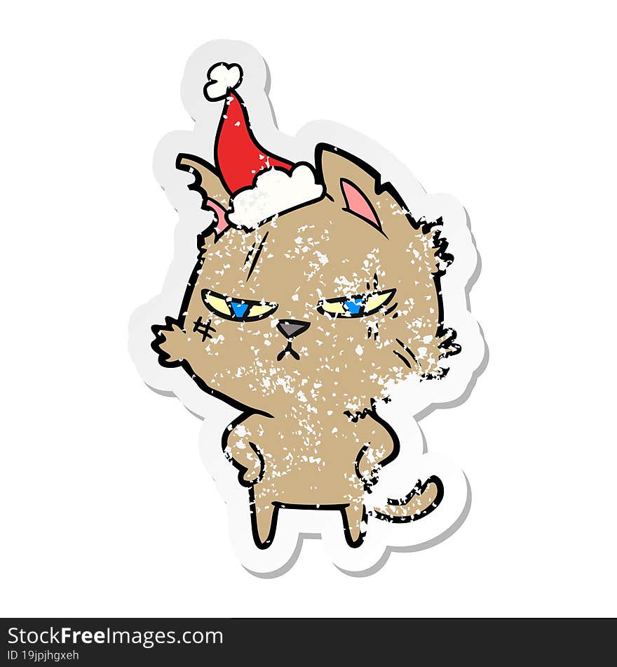 tough distressed sticker cartoon of a cat wearing santa hat