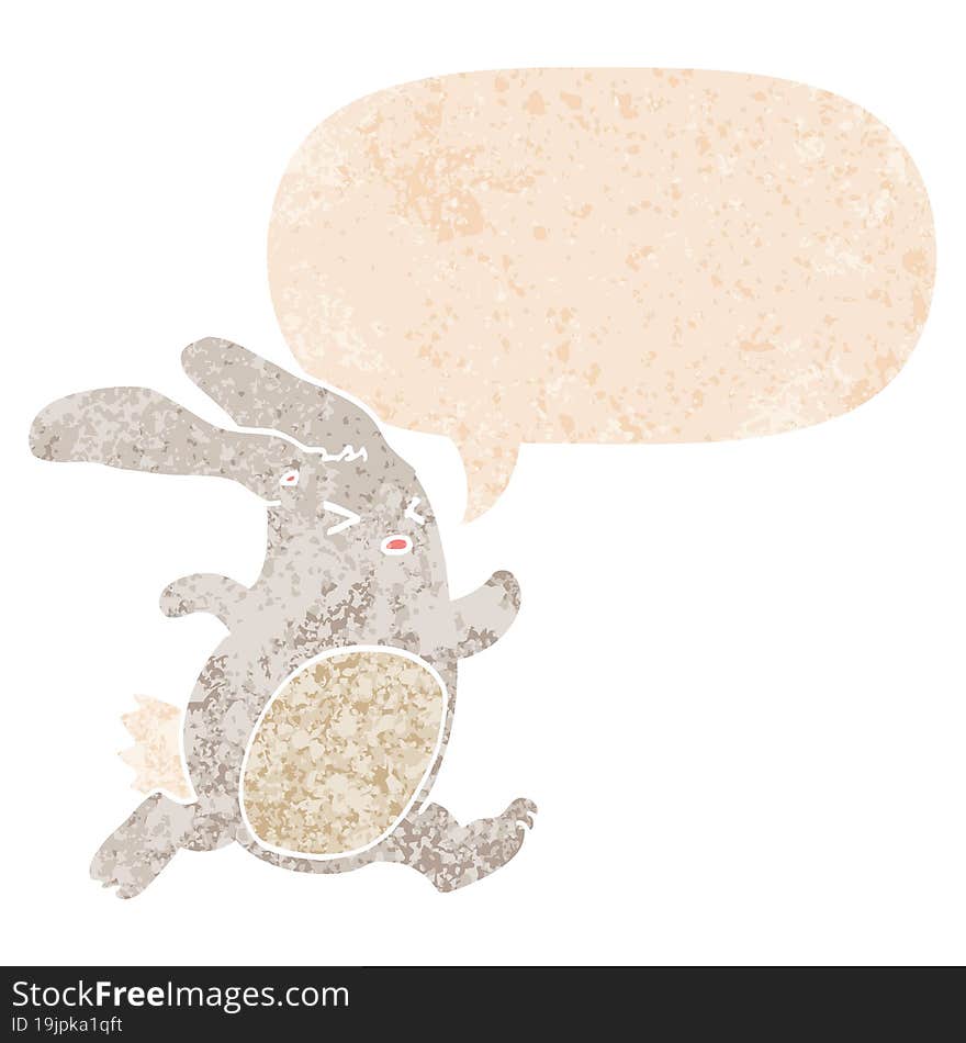 cartoon rabbit with speech bubble in grunge distressed retro textured style. cartoon rabbit with speech bubble in grunge distressed retro textured style