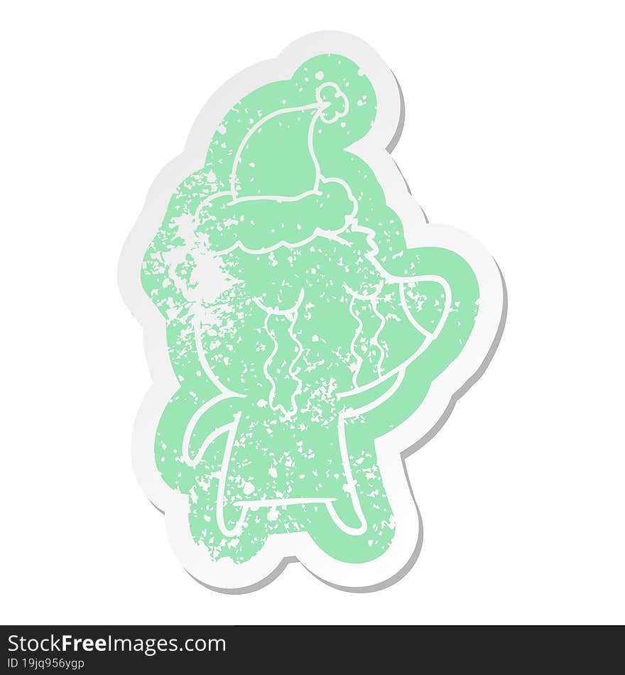 quirky cartoon distressed sticker of a crying bear wearing santa hat