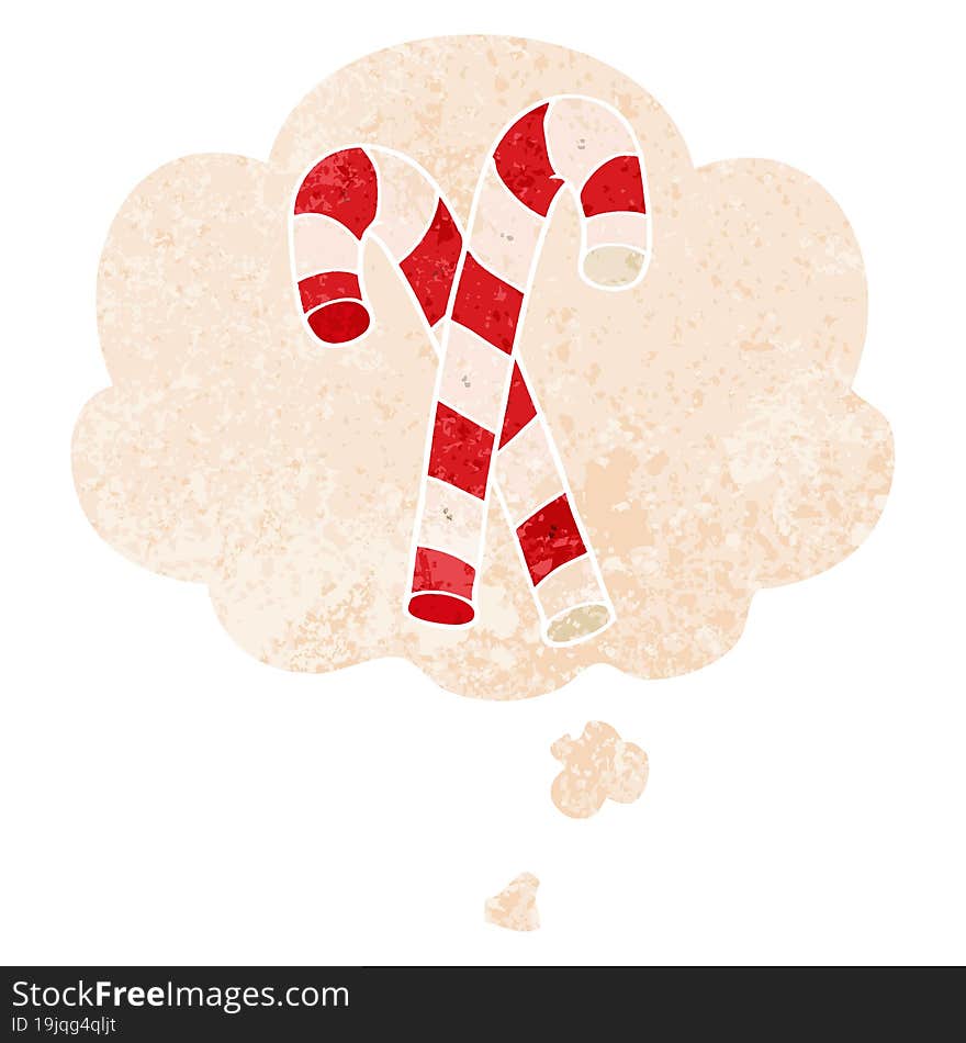 cartoon candy canes and thought bubble in retro textured style