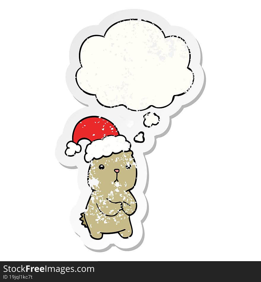 cartoon christmas bear worrying with thought bubble as a distressed worn sticker