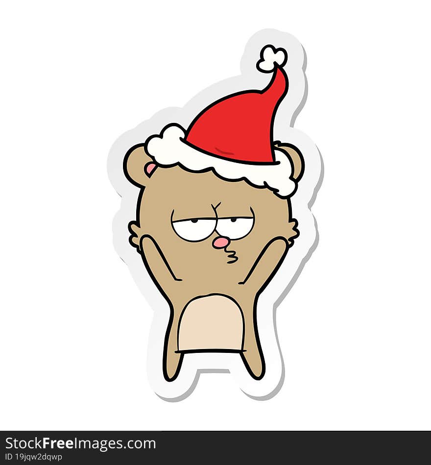 bored bear sticker cartoon of a wearing santa hat