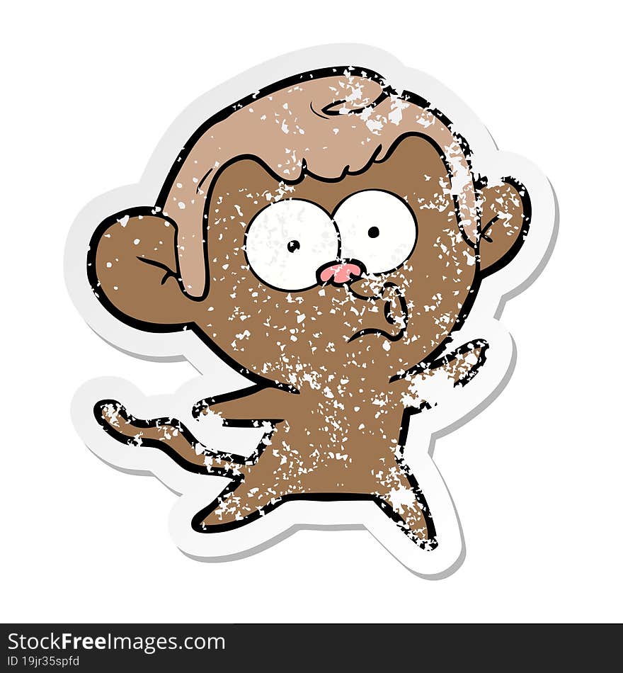 distressed sticker of a cartoon surprised monkey