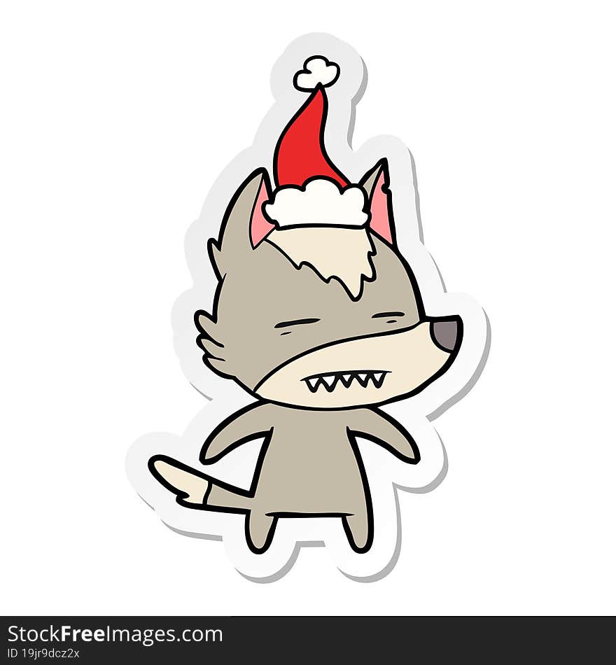 Sticker Cartoon Of A Wolf Showing Teeth Wearing Santa Hat