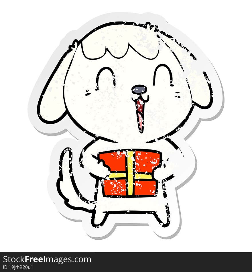 distressed sticker of a cute cartoon dog with christmas present