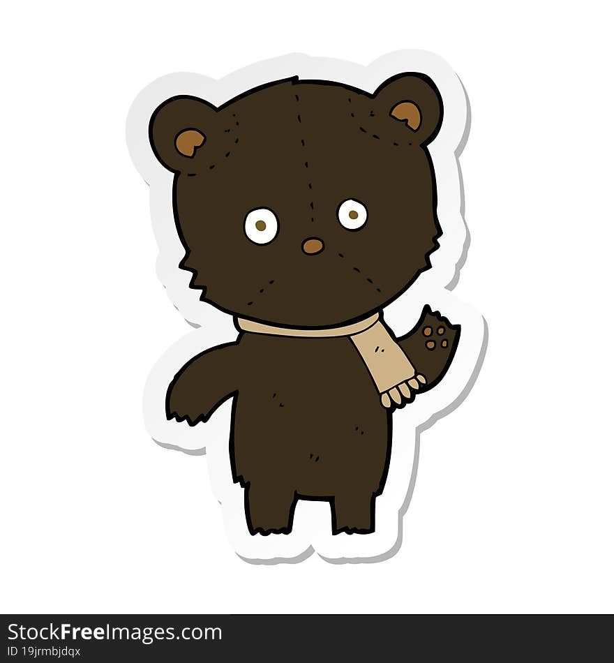 sticker of a cartoon waving black bear