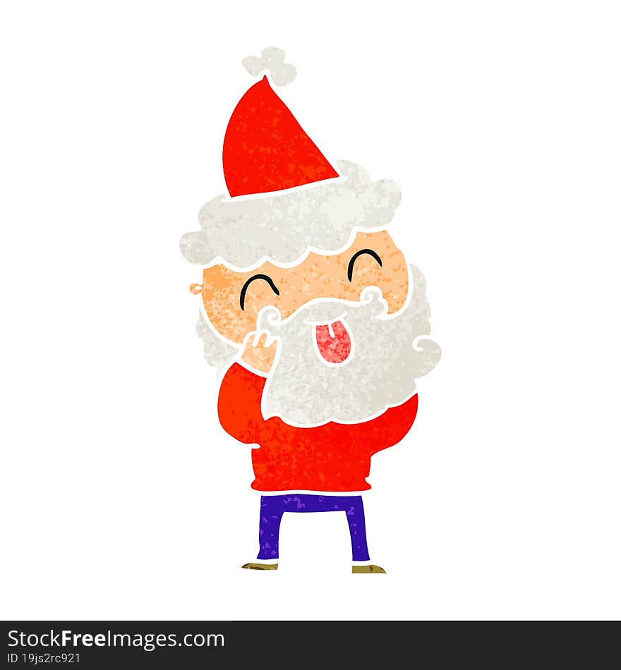 man with beard sticking out tongue wearing santa hat