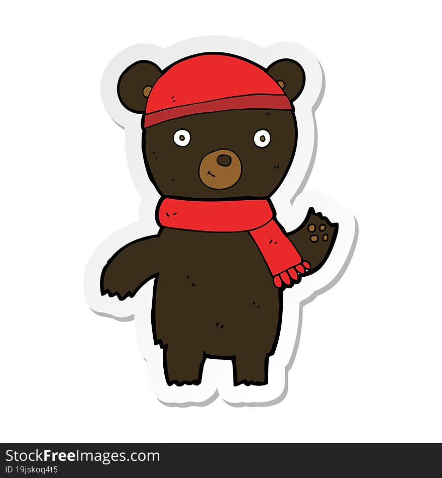 sticker of a cartoon waving black bear