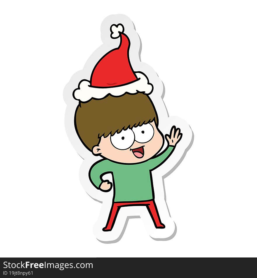 happy sticker cartoon of a boy wearing santa hat