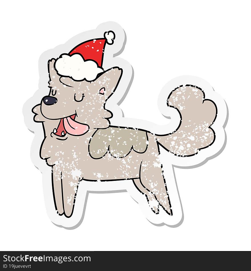 distressed sticker cartoon of a happy dog wearing santa hat