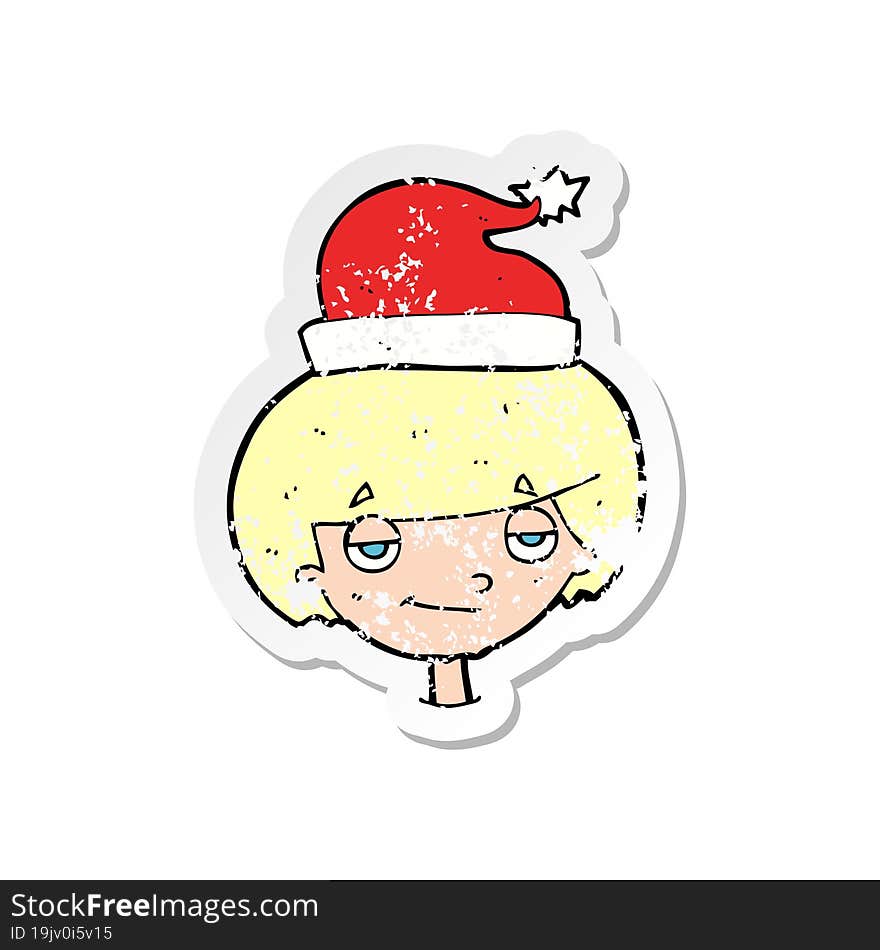 retro distressed sticker of a cartoon boy in santa hat