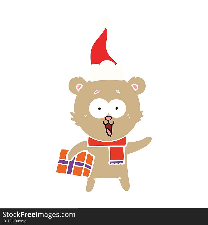 laughing teddy  bear with christmas present wearing santa hat