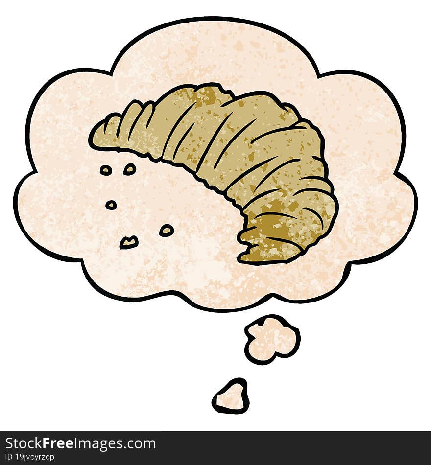 cartoon croissant and thought bubble in grunge texture pattern style