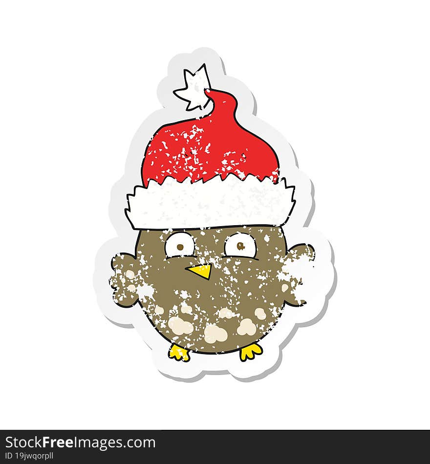 retro distressed sticker of a cartoon owl wearing christmas hat