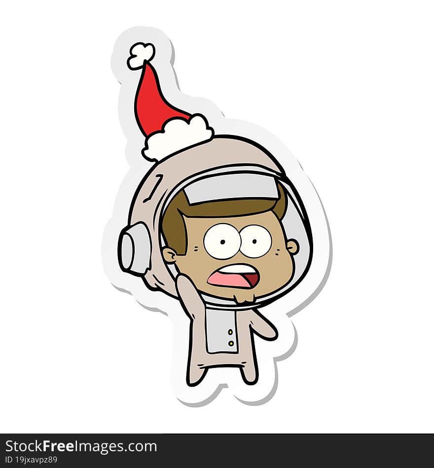 sticker cartoon of a surprised astronaut wearing santa hat