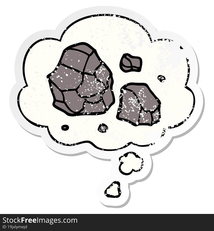 cartoon rocks and thought bubble as a distressed worn sticker