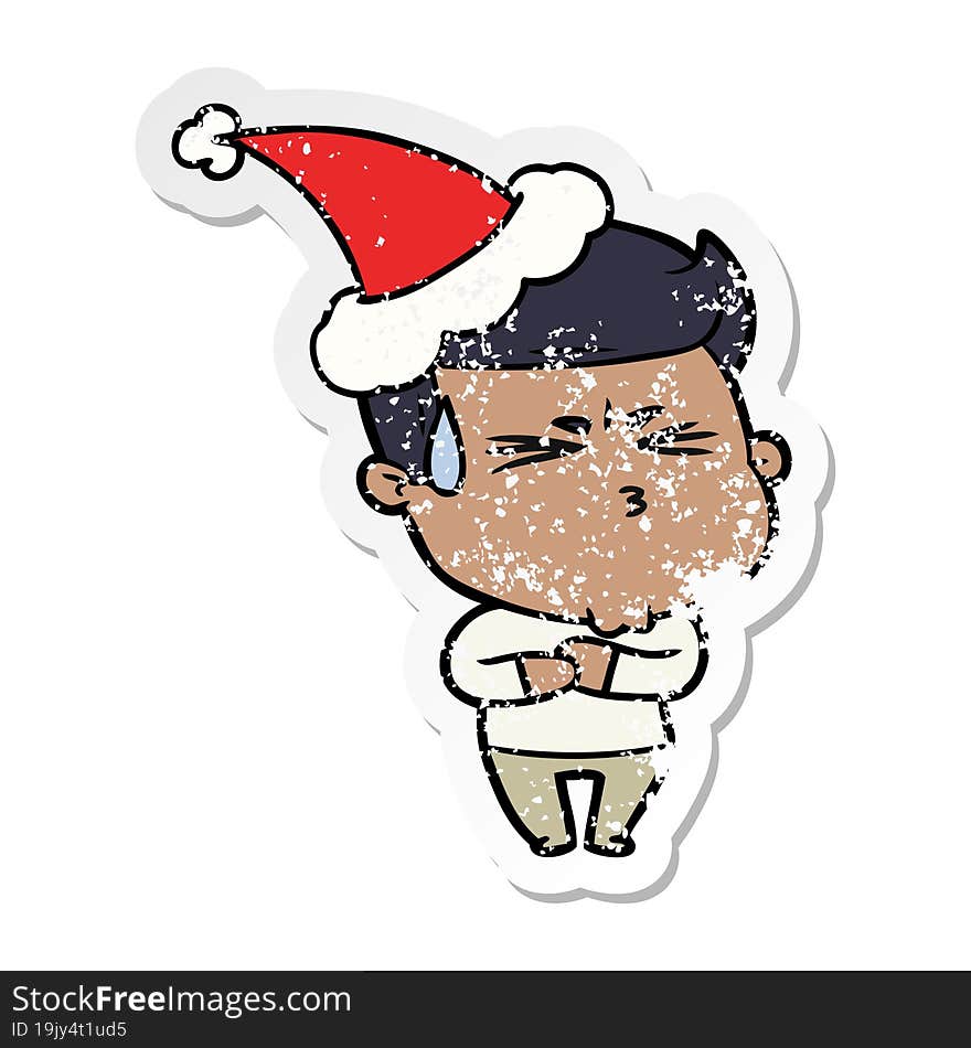 distressed sticker cartoon of a frustrated man wearing santa hat