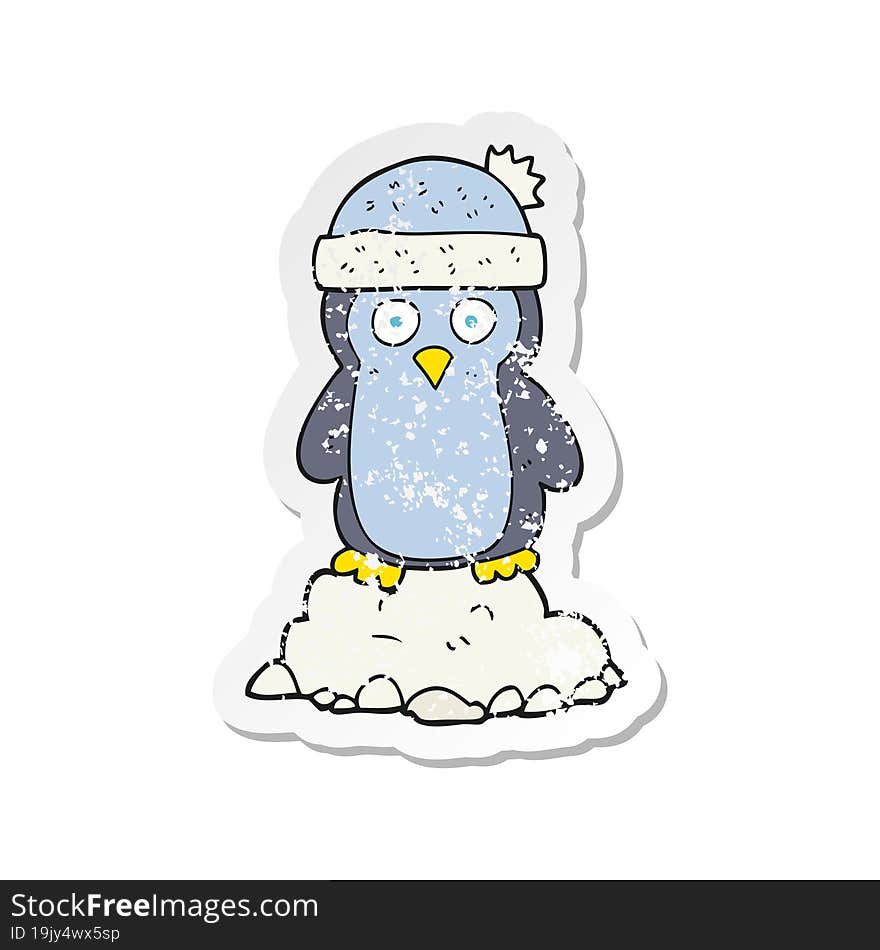 retro distressed sticker of a cartoon penguin wearing hat