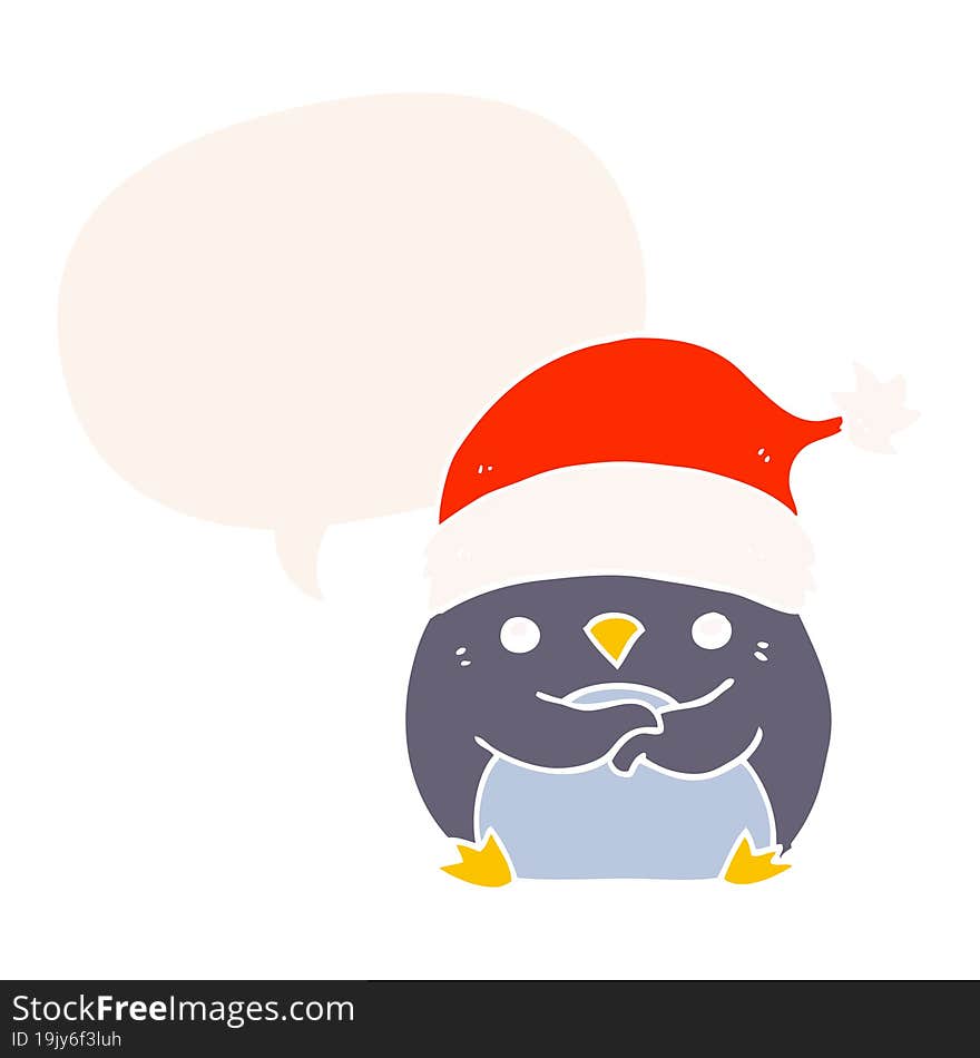 cute cartoon penguin wearing christmas hat and speech bubble in retro style