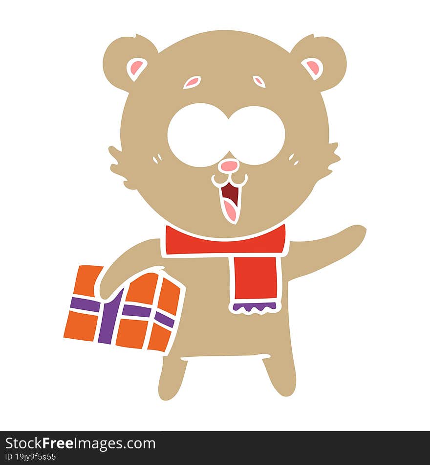 laughing teddy  bear with christmas present