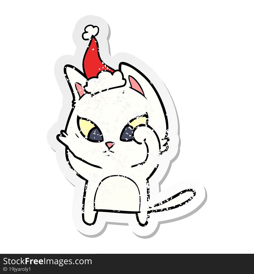 confused distressed sticker cartoon of a cat wearing santa hat