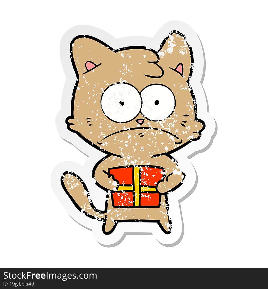 distressed sticker of a cartoon cat with present