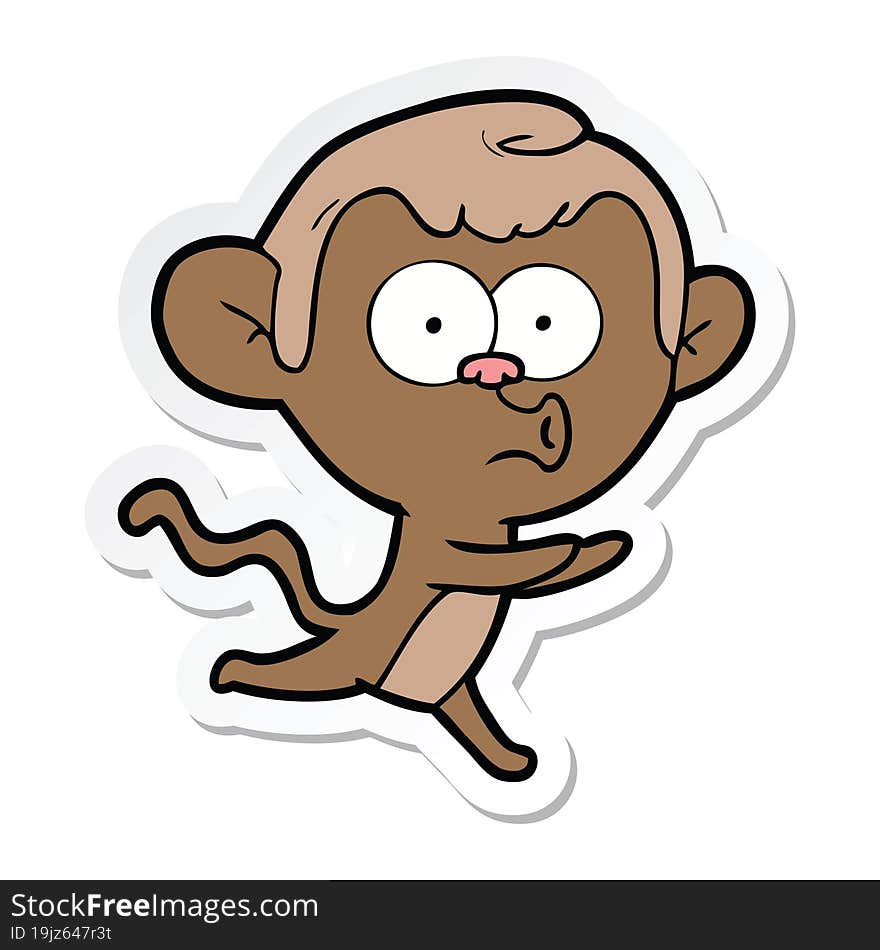 sticker of a cartoon hooting monkey