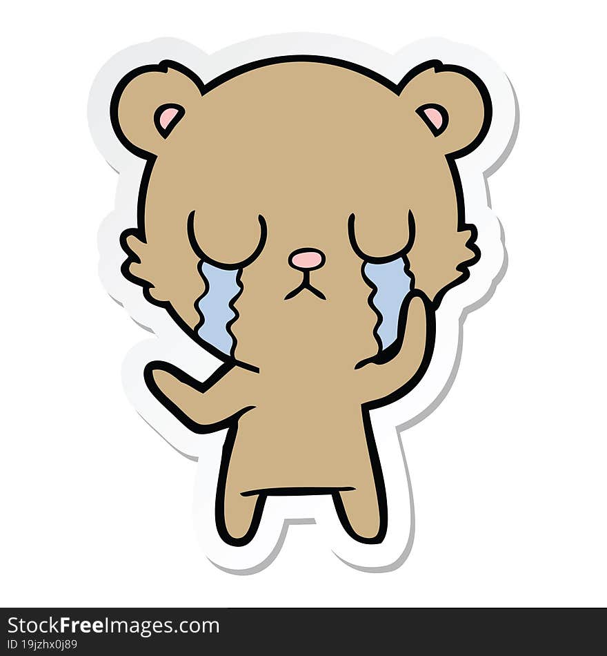 sticker of a crying cartoon bear