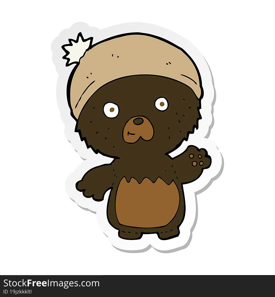 sticker of a cartoon cute teddy bear in hat