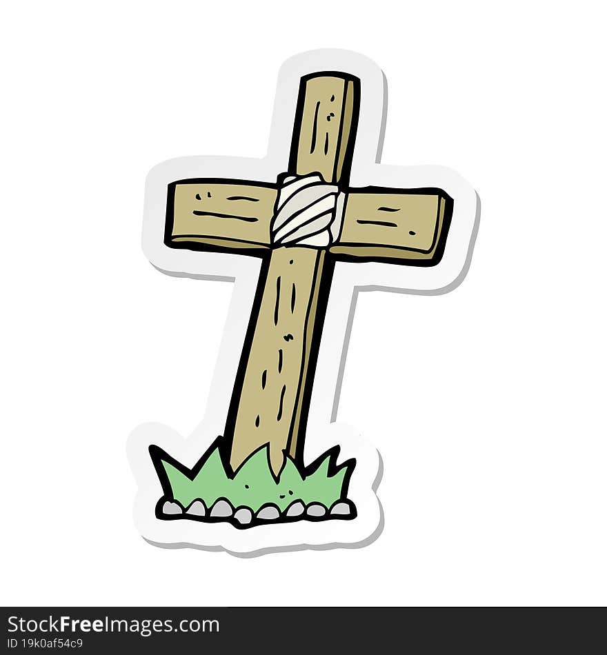 sticker of a cartoon wooden cross grave