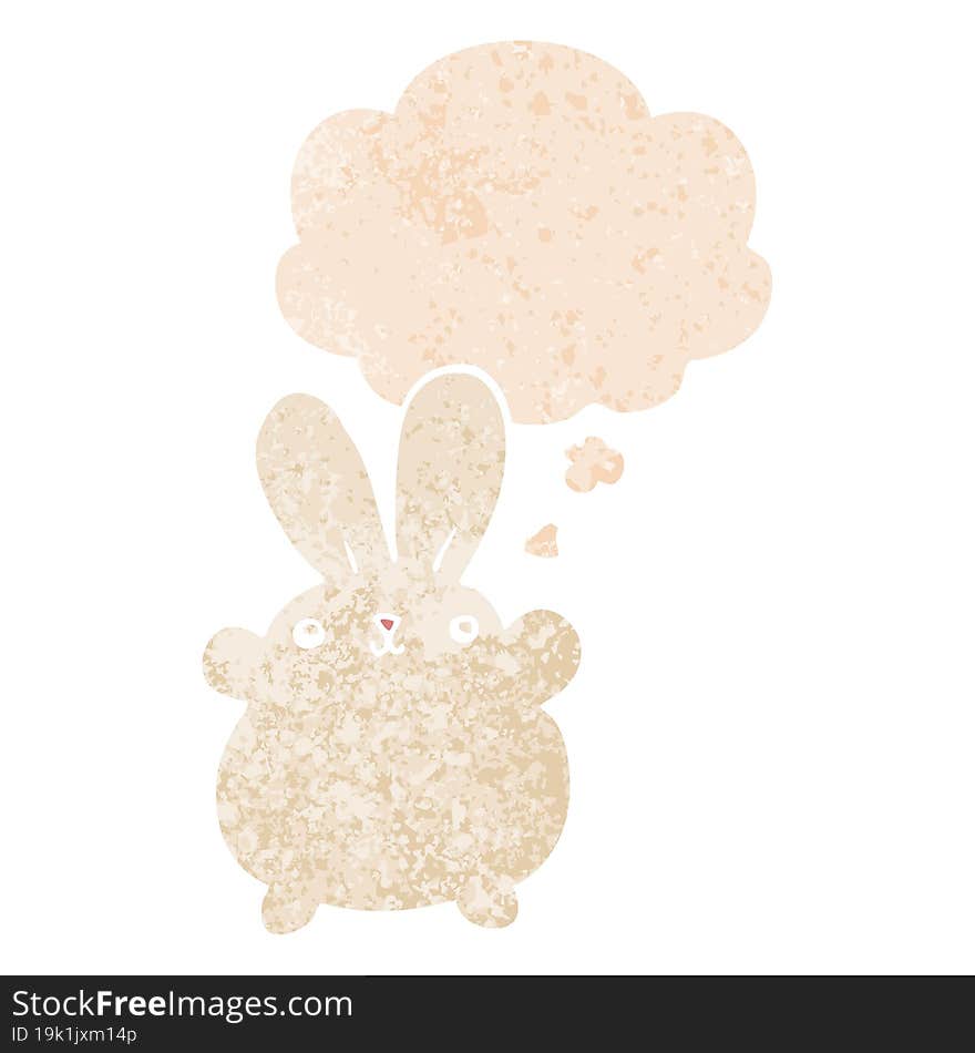 cute cartoon rabbit and thought bubble in retro textured style