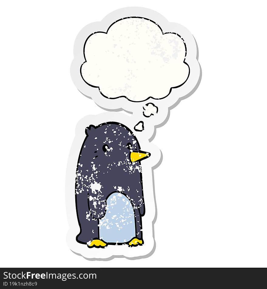 cartoon penguin and thought bubble as a distressed worn sticker