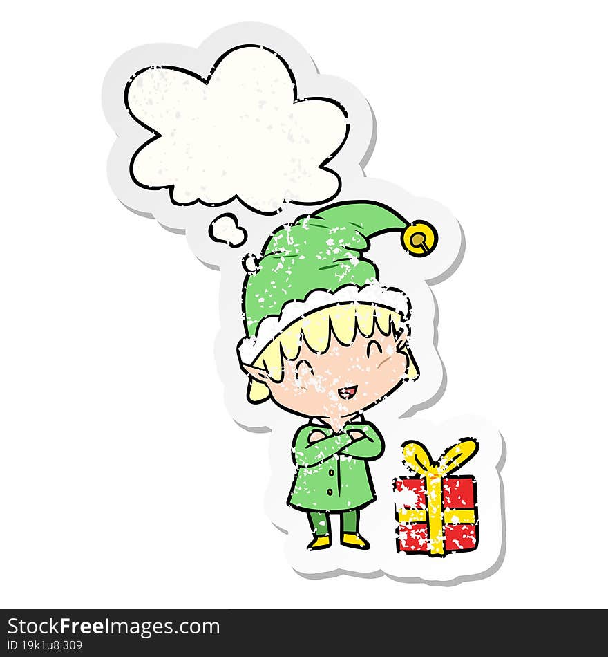 cartoon happy christmas elf and thought bubble as a distressed worn sticker