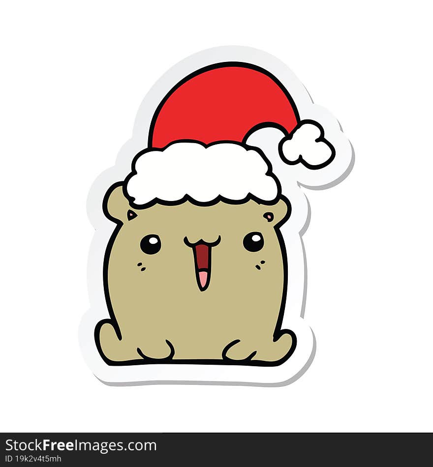 sticker of a cute cartoon bear with christmas hat