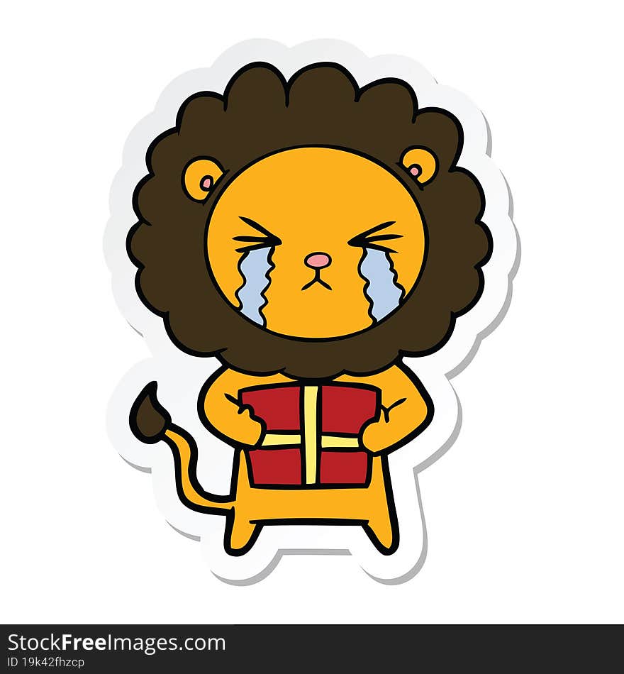 sticker of a cartoon crying lion with gift