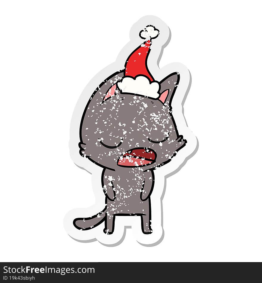 talking cat distressed sticker cartoon of a wearing santa hat