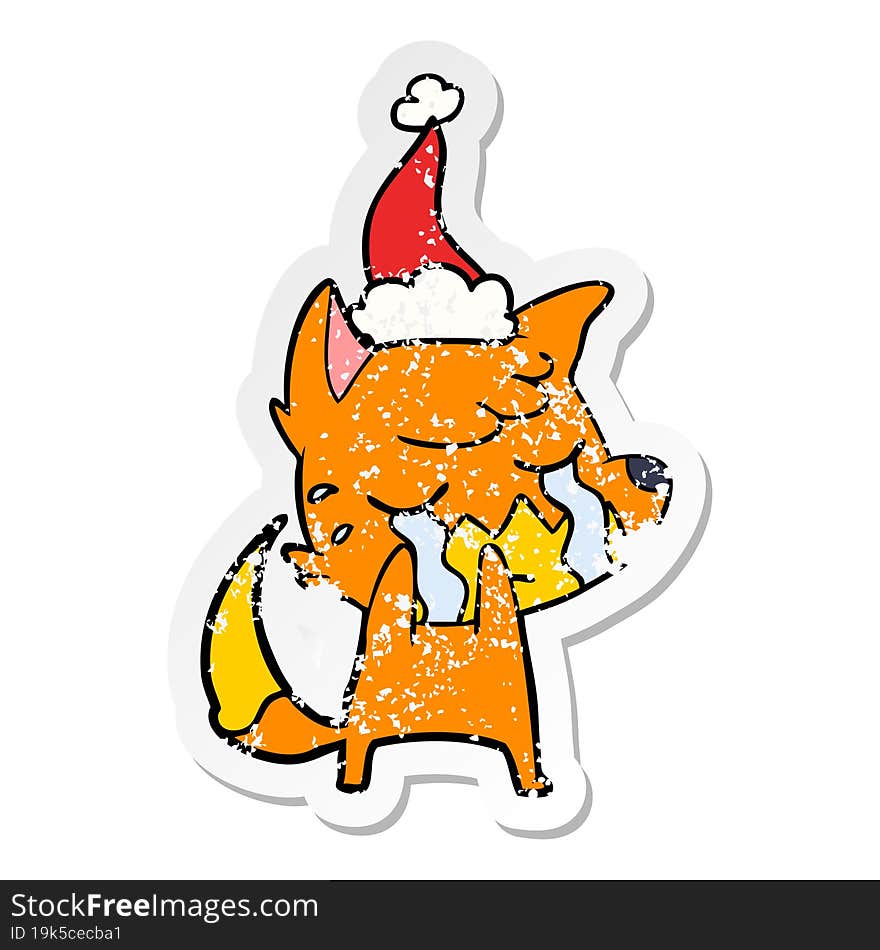 crying fox distressed sticker cartoon of a wearing santa hat