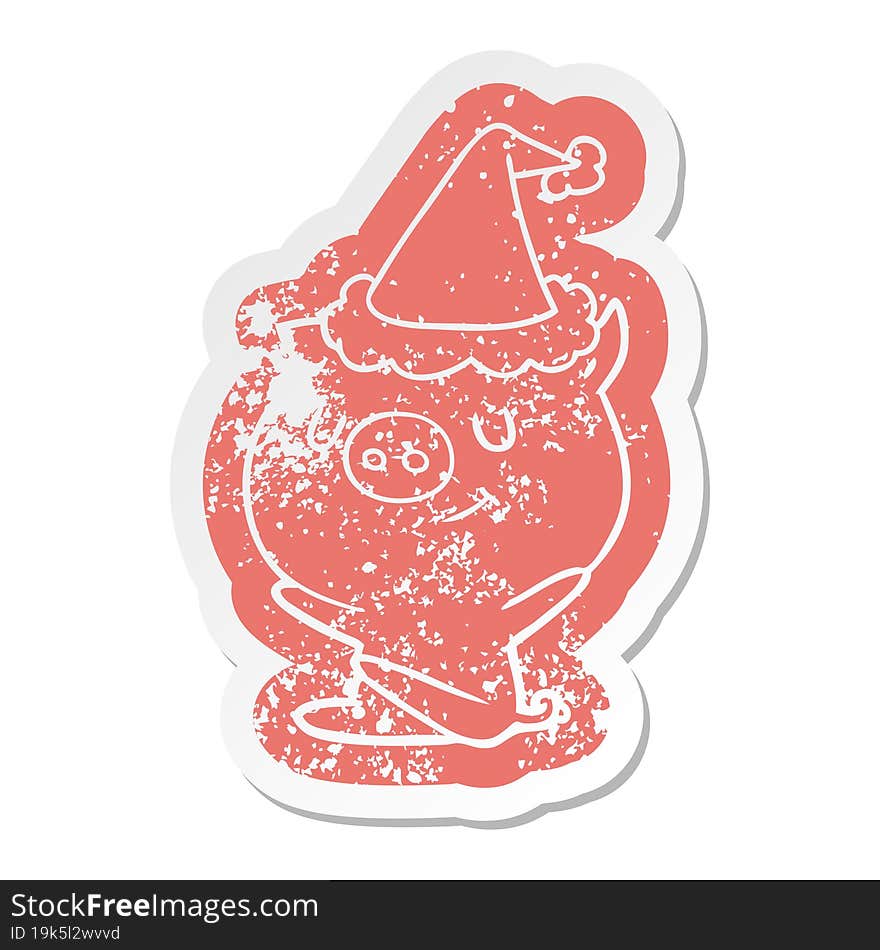 happy cartoon distressed sticker of a pig wearing santa hat