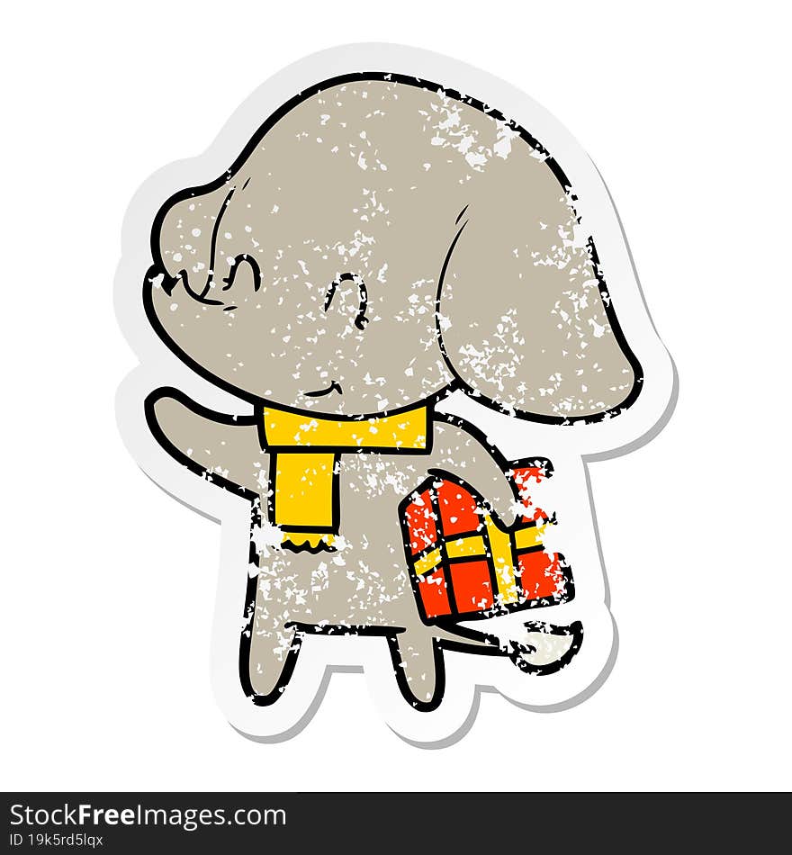 distressed sticker of a cute cartoon christmas elephant