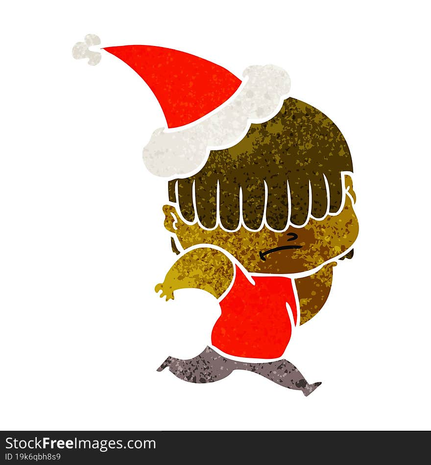 retro cartoon of a boy with untidy hair wearing santa hat