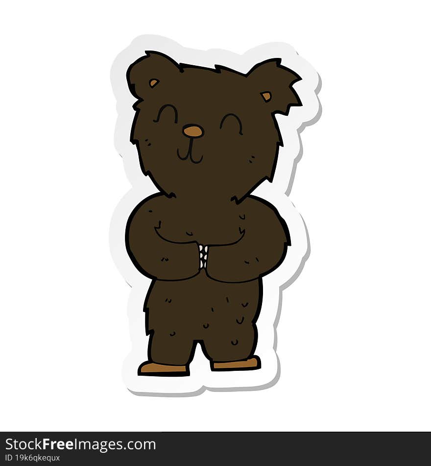 sticker of a cartoon happy little black bear