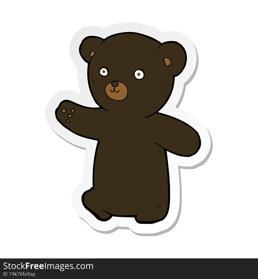 sticker of a cartoon black bear cub