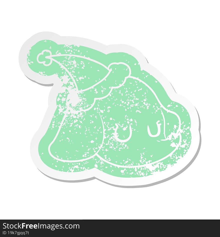 cartoon distressed sticker of a elephant face wearing santa hat