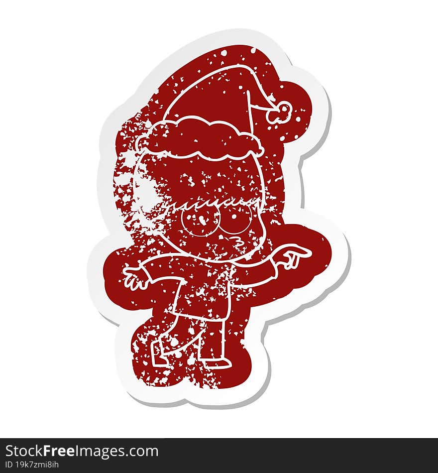 Nervous Cartoon Distressed Sticker Of A Boy Wearing Santa Hat