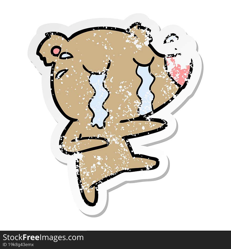 distressed sticker of a cartoon crying bear