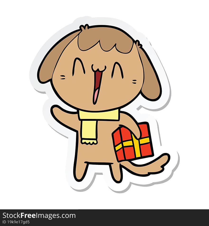 sticker of a cute cartoon dog with christmas present