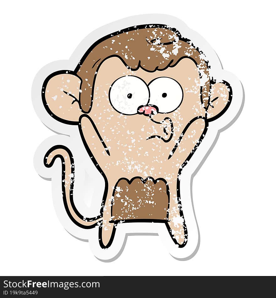 distressed sticker of a cartoon surprised monkey