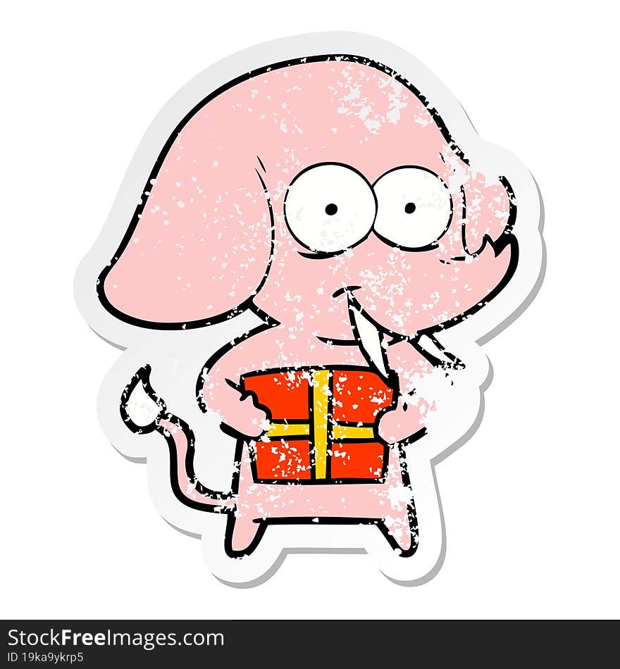 distressed sticker of a happy cartoon elephant with present