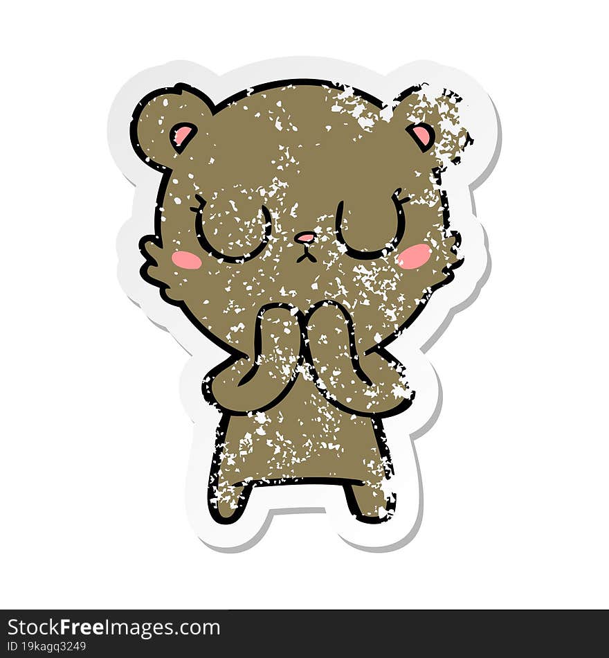 distressed sticker of a peaceful cartoon bear cub