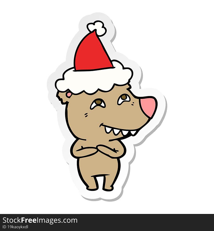 Sticker Cartoon Of A Bear Showing Teeth Wearing Santa Hat